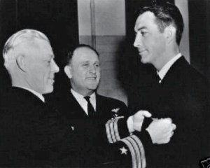 Receiving his wings. Left: Commander Paul E. Gillespie; Center Captain Dixie Kiefen, hero of the Battle of Midway.