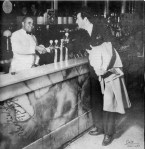 Robert Taylor visits with Charlie Scott at Beatrice's Penner Soda Fountain in 1936.  (Gage County Historical Society)