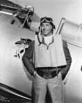 Actor Robert Taylor Posing by Airplane from Movie Scene